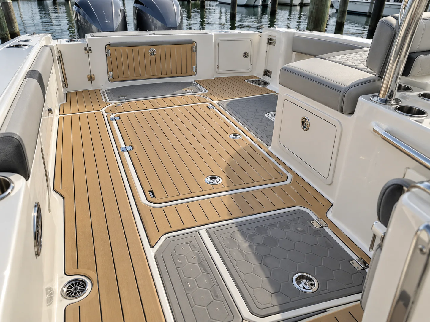 Precision-installed synthetic teak and EVA foam boat flooring